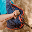 Adjusting the Grand Trunk ROVR cinch cord clip for adjustable comfort